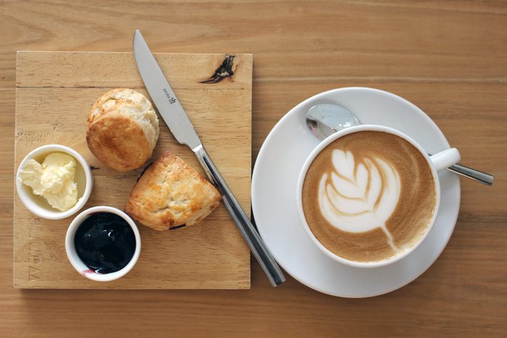 Coffee with Leaf Art with Scones and Jam