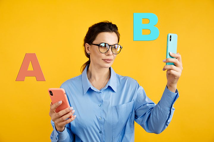 conversion funnel, A B test in marketing and online advertising. Brunette woman holding colored letters A and B in hands with face expression