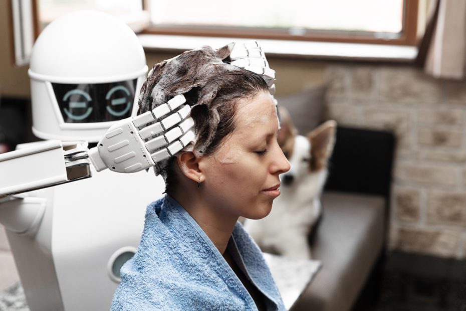 ambient assisted living household robot is washing the hair of a