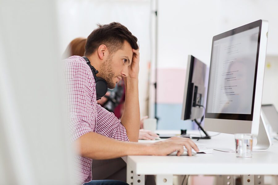 stressed software developer at office