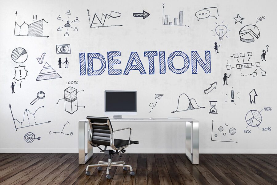 IDEATION | Desk in an office with symbols