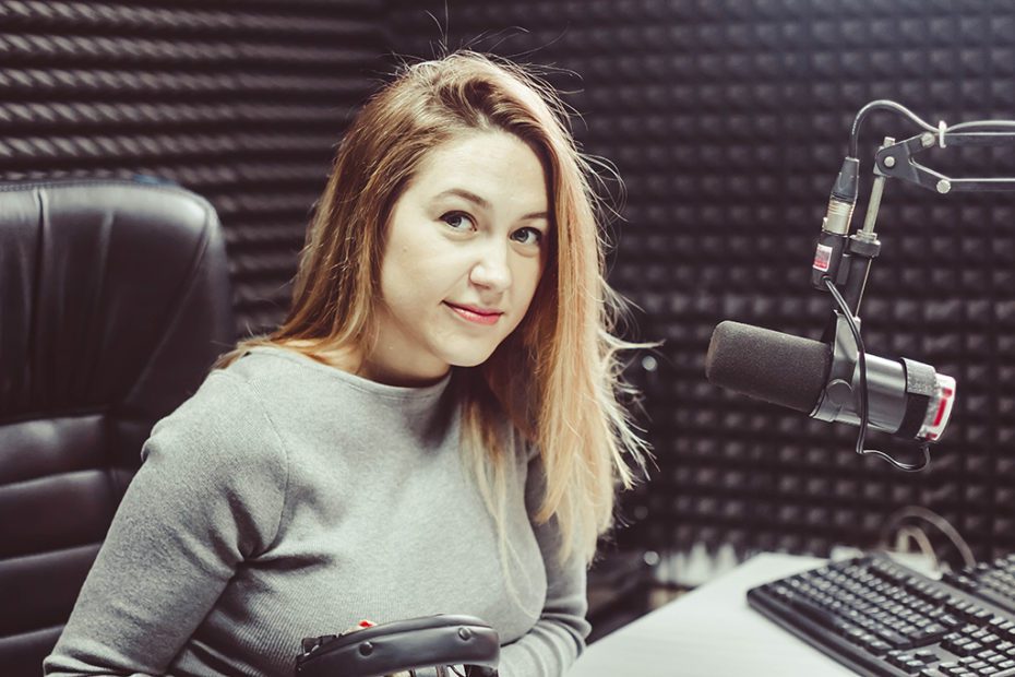 the girl at the microphone in the Studio