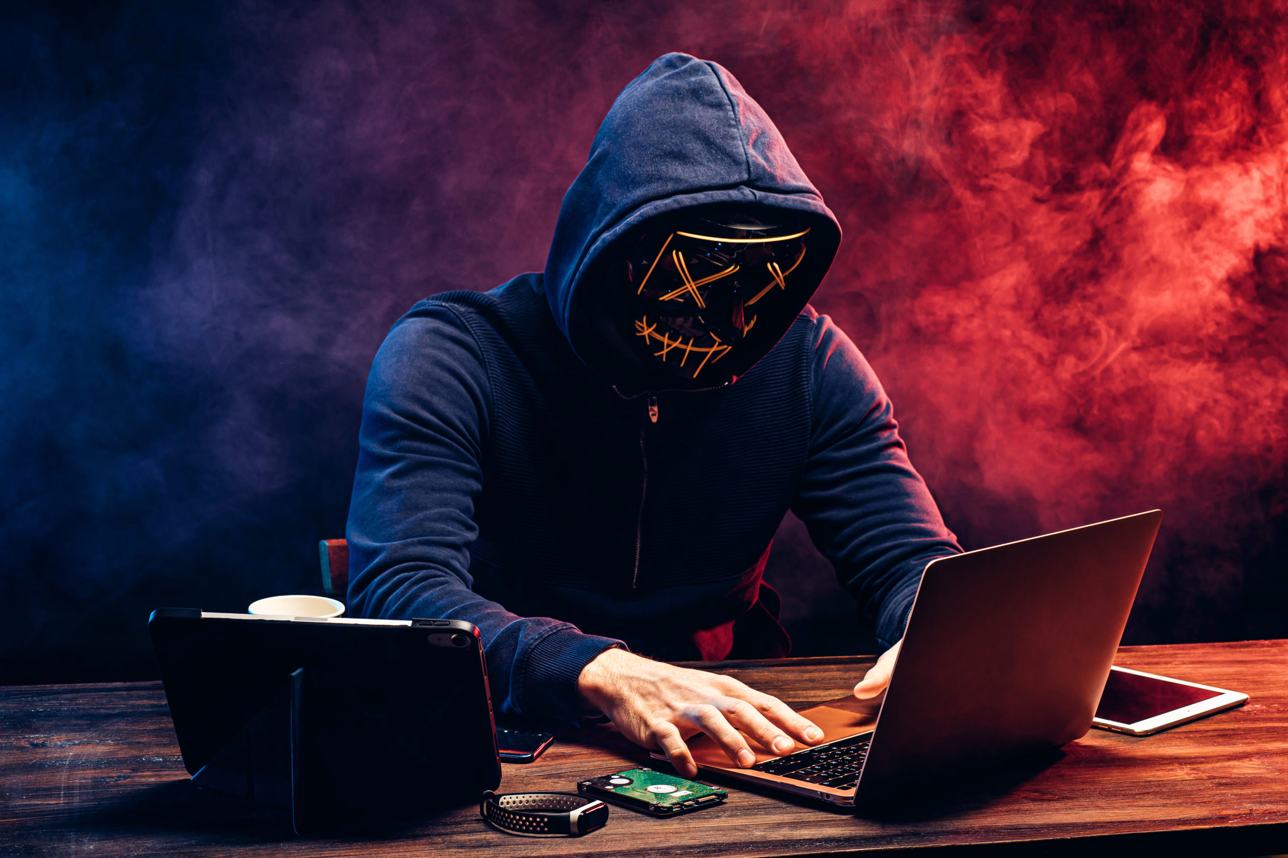 hacker man typing on laptop, hacking computer system