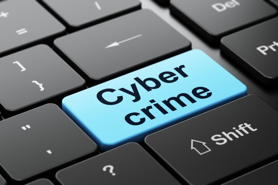 Security concept: Cyber Crime on computer keyboard background