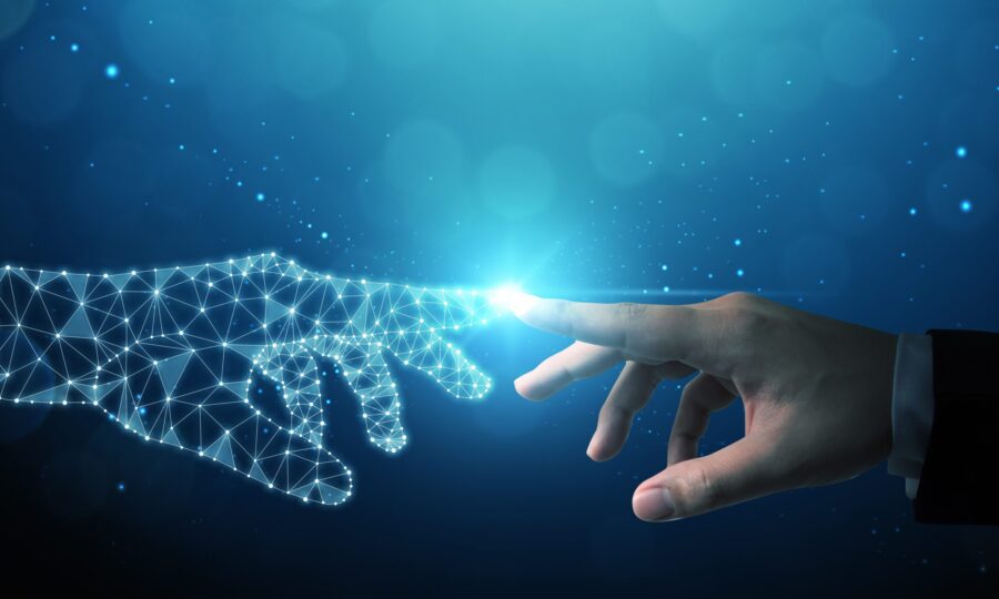 Hand of businessman touching hand artificial intelligence meaning technology connection go to future