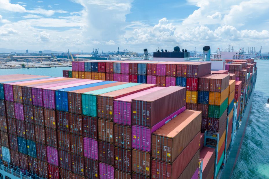 A large cargo ship filled with shipping containers