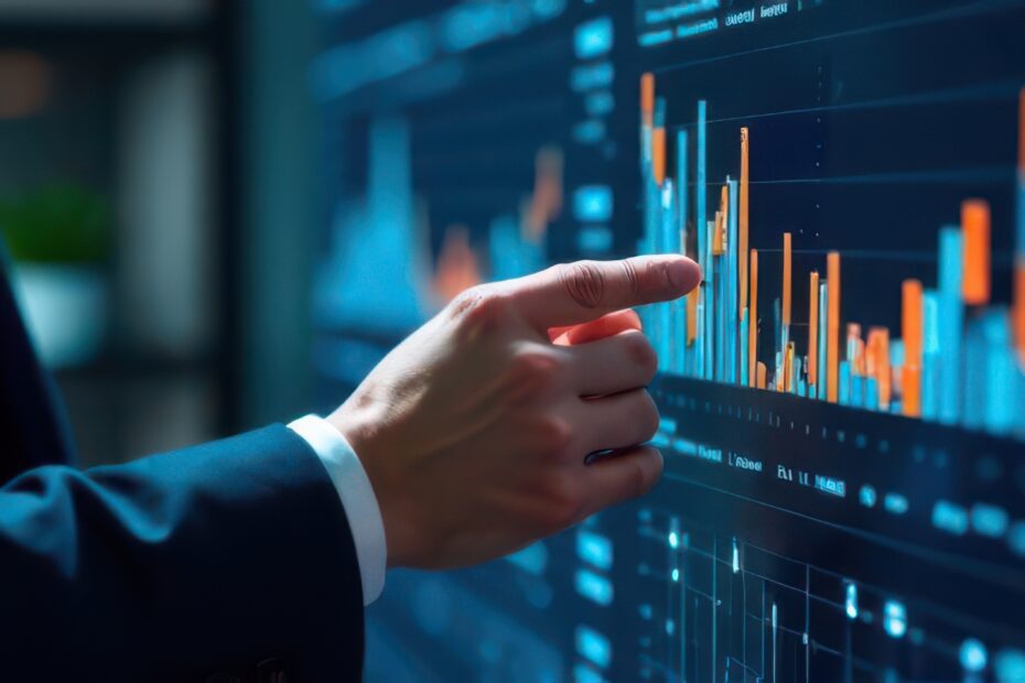 Businessman analyzing financial charts on interactive screen